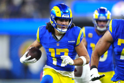 Dec 28, 2024; Inglewood, California, USA; Los Angeles Rams wide receiver Puka Nacua (17) carries the ball against the Arizona Cardinals in the second half at SoFi Stadium. Mandatory Credit: Kirby Lee-Imagn Images