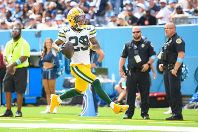 Sep 22, 2024; Nashville, Tennessee, USA;  Green Bay Packers cornerback Jaire Alexander (23) scores on a pick six thrown by Tennessee Titans Will Levis (8) during the first half at Nissan Stadium. Mandatory Credit: Steve Roberts-Imagn Images