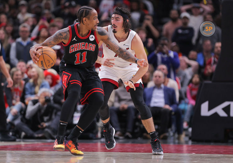 CHICAGO, IL - NOVEMBER 18: Jaime Jaquez Jr. #11 of the Miami Heat guards DeMar DeRozan #11 of the Chicago Bulls during the second half at the United Center on November 18, 2023 in Chicago, Illinois. (Photo by Melissa Tamez/Icon Sportswire)