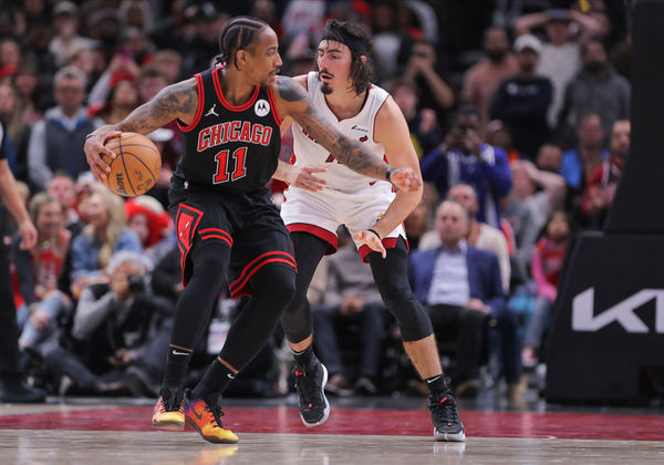 CHICAGO, IL - NOVEMBER 18: Jaime Jaquez Jr. #11 of the Miami Heat guards DeMar DeRozan #11 of the Chicago Bulls during the second half at the United Center on November 18, 2023 in Chicago, Illinois. (Photo by Melissa Tamez/Icon Sportswire)