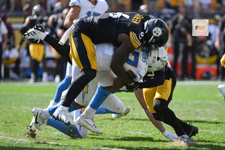 Sep 22, 2024; Pittsburgh, Pennsylvania, USA; Pittsburgh Steelers linebacker Patrick Queen (6) tackles Los Angeles Chargers running back JK Dobbins during the fourth quarter at Acrisure Stadium. Credit: Barry Reeger-Imagn Images