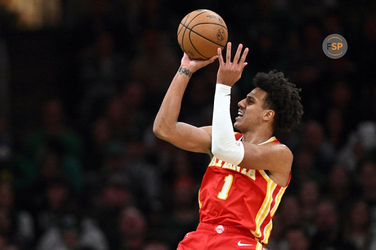 Jan 18, 2025; Boston, Massachusetts, USA; Atlanta Hawks forward Jalen Johnson (1) attempts a basket against the Boston Celtics during the third quarter at the TD Garden. Credit: Brian Fluharty-Imagn Images