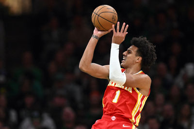 Jan 18, 2025; Boston, Massachusetts, USA; Atlanta Hawks forward Jalen Johnson (1) attempts a basket against the Boston Celtics during the third quarter at the TD Garden. Mandatory Credit: Brian Fluharty-Imagn Images