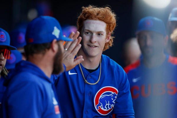 PEORIA, AZ - MARCH 22: Chicago Cubs right fielder Owen Caissie (97) scores a run during a Spring Training Baseball game between the Chicago Cubs and Seattle Mariners on March 22, 2022, at Peoria Stadium in Peoria, AZ. (Photo by Brandon Sloter/Icon Sportswire)