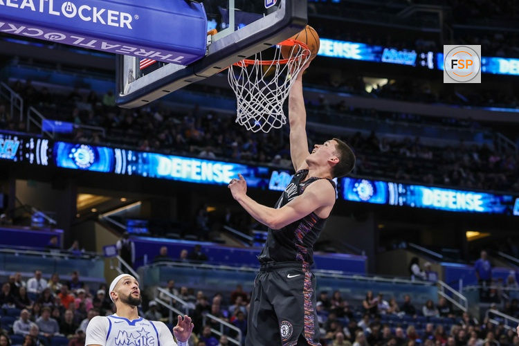 Feb 5, 2026; Orlando, Florida, USA; Brooklyn Nets guard Egor Demin (8) dunks during the first quarter against the Orlando Magic at Kia Center. Credit: Mike Watters-Imagn Images