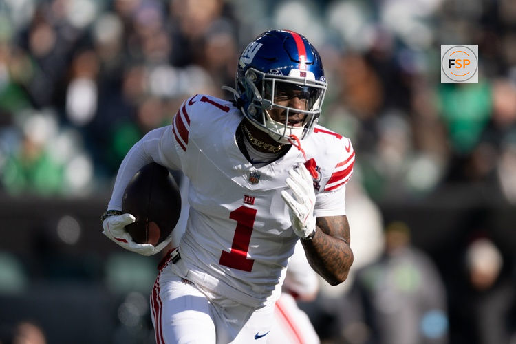 Jan 5, 2025; Philadelphia, Pennsylvania, USA; New York Giants wide receiver Malik Nabers (1) runs with the ball against the Philadelphia Eagles during the first quarter at Lincoln Financial Field. Credit: Bill Streicher-Imagn Images