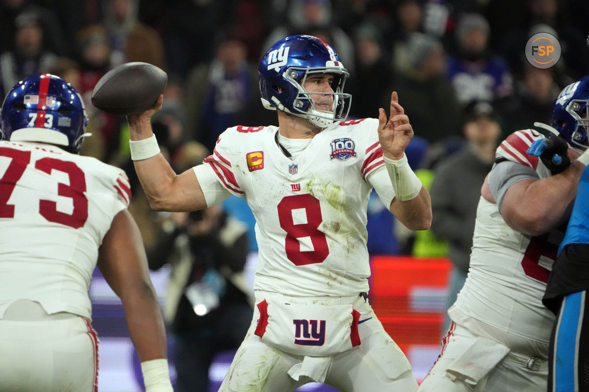 Nov 10, 2024; Munich, Germany; New York Giants quarterback Daniel Jones (8) throws the ball against the Carolina Panthers  in the second half during the 2024 NFL Munich Game at Allianz Arena. Credit: Kirby Lee-Imagn Images