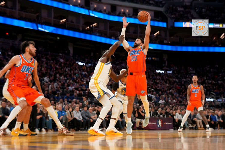 Dec 2, 2025; San Francisco, California, USA; Oklahoma City Thunder guard Ajay Mitchell (25) makes a shot over Golden State Warriors forward Draymond Green (23) in the fourth quarter at the Chase Center. Credit: Cary Edmondson-Imagn Images