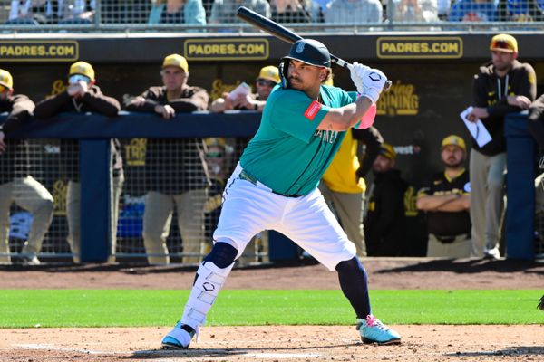 Feb 20, 2026; Peoria, Arizona, USA; Seattle Mariners first baseman Josh Naylor (12) at bat in the first inning against the San Diego Padres during a Spring Training game at Peoria Sports Complex. Mandatory Credit: Matt Kartozian-Imagn Images