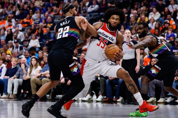 Jan 17, 2026; Denver, Colorado, USA; Washington Wizards forward Marvin Bagley III (35) controls the ball under pressure from Denver Nuggets forward Zeke Nnaji (22) in the third quarter at Ball Arena. Mandatory Credit: Isaiah J. Downing-Imagn Images