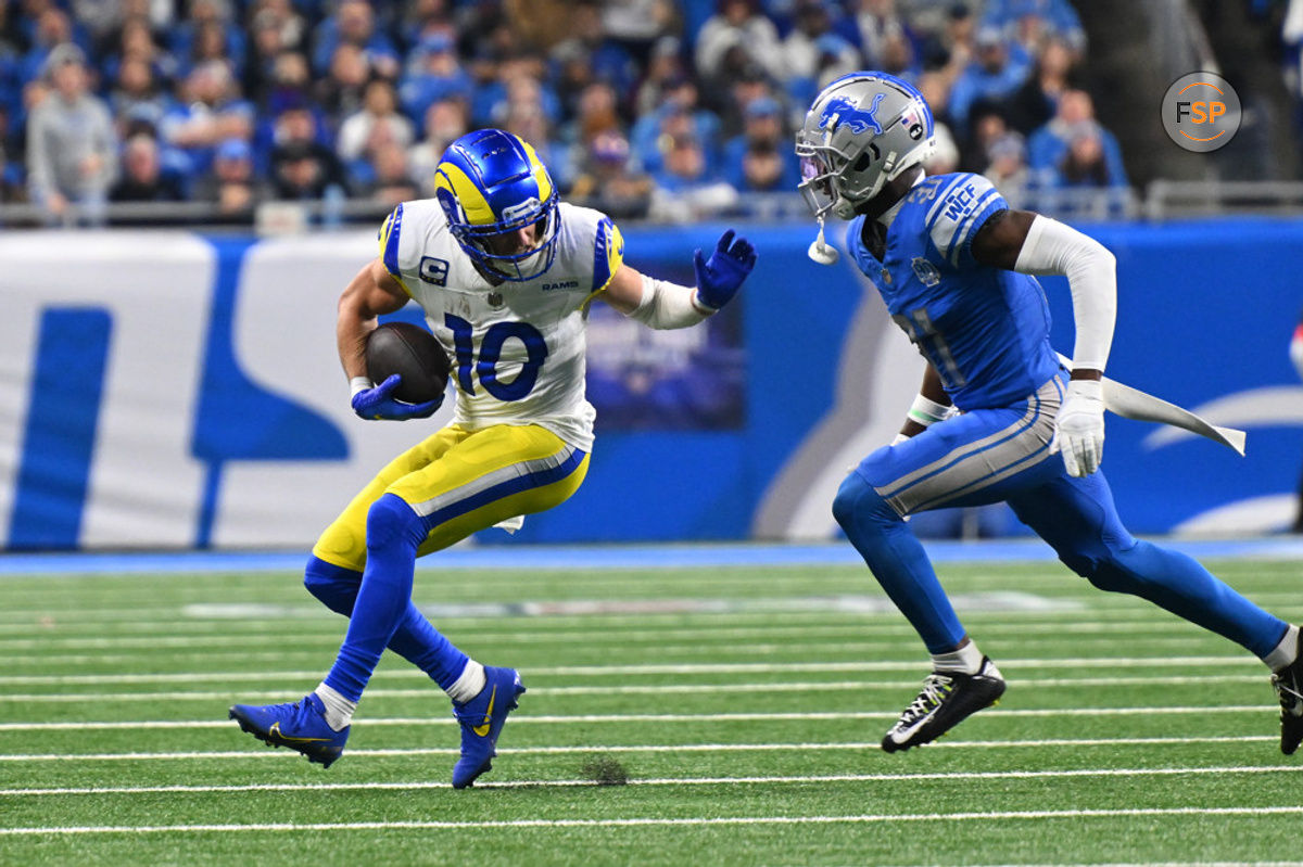 DETROIT, MI - JANUARY 14: Los Angeles Rams wide receiver Cooper Kupp (10) braces for Detroit Lions safety Tracy Walker III (21) during the NFC Wild Card game between the Detroit Lions and the Los Angeles Rams game on Sunday January 14, 2023 at Ford Field in Detroit, MI. (Photo by Steven King/Icon Sportswire)