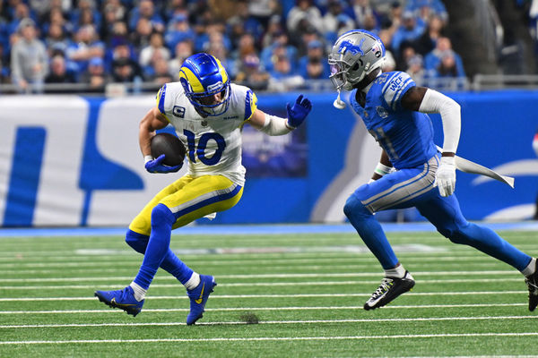 DETROIT, MI - JANUARY 14: Los Angeles Rams wide receiver Cooper Kupp (10) braces for Detroit Lions safety Tracy Walker III (21) during the NFC Wild Card game between the Detroit Lions and the Los Angeles Rams game on Sunday January 14, 2023 at Ford Field in Detroit, MI. (Photo by Steven King/Icon Sportswire)