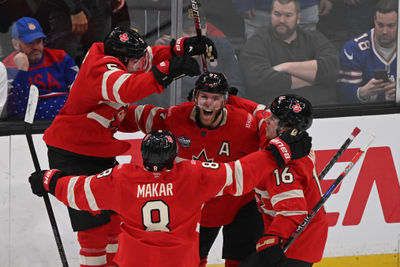 Feb 20, 2025; Boston, MA, USA; [Imagn Images direct customers only]  Team Canada forward Connor McDavid (97) celebrates scoring in overtime to win with defenseman Devon Toews (5) and defenseman Cale Makar (8) and forward Mitch Marner (16) against Team USA during the 4 Nations Face-Off ice hockey championship game at TD Garden. Mandatory Credit: Brian Fluharty-Imagn Images