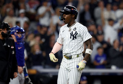 Oct 30, 2024; New York, New York, USA; New York Yankees third baseman Jazz Chisholm Jr. (13) reacts after hitting a home run during the first inning against the Los Angeles Dodgers in game five of the 2024 MLB World Series at Yankee Stadium. Mandatory Credit: Vincent Carchietta-Imagn Images