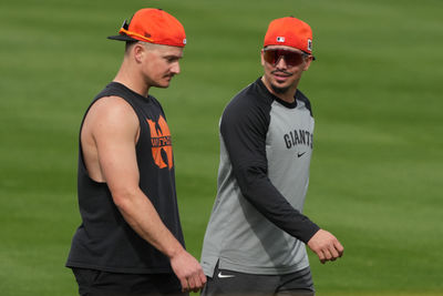 Feb 13, 2025; Scottsdale, AZ, USA; San Francisco Giants third base Matt Chapman (26) and shortstop Willy Adames (2) talk during spring training camp. Mandatory Credit: Rick Scuteri-Imagn Images