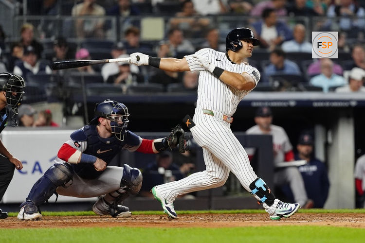 Sep 12, 2024; Bronx, New York, USA; New York Yankees left fielder Jasson Dominguez (89) hits a single against the Boston Red Sox during the second inning at Yankee Stadium. Credit: Gregory Fisher-Imagn Images