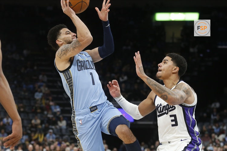 Feb 23, 2026; Memphis, Tennessee, USA; Memphis Grizzlies guard Scotty Pippen Jr. (1) shoots as Sacramento Kings guard Killian Hayes (3) defends during the fourth quarter at FedExForum. Credit: Petre Thomas-Imagn Images