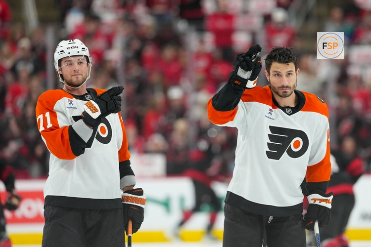 May 4, 2026; Raleigh, North Carolina, USA; Philadelphia Flyers right wing Garnet Hathaway (19) and right wing Tyson Foerster (71) react during the warmups before the game against the Carolina Hurricanes in game two of the second round of the 2026 Stanley Cup Playoffs at Lenovo Center. Credit: James Guillory-Imagn Images