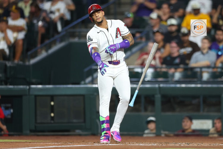 Aug 3, 2026; Phoenix, Arizona, USA; Arizona Diamondbacks second baseman Ketel Marte (4) throws the bat after drawing a walk against San Diego Padres pitcher Michael King (34) in the first inning at Chase Field. Credit: Anna Carrington-Imagn Images