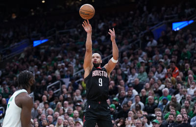 Jan 27, 2025; Boston, Massachusetts, USA; Houston Rockets forward Dillon Brooks (9) shoots for three points against the Boston Celtics in the second half at TD Garden. Mandatory Credit: David Butler II-Imagn Images