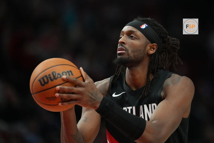 Feb 7, 2026; Portland, Oregon, USA; Portland Trail Blazers forward Jerami Grant (9) prepares to shoot a technical free throw during the first half against the Memphis Grizzlies at Moda Center. Credit: Soobum Im-Imagn Images