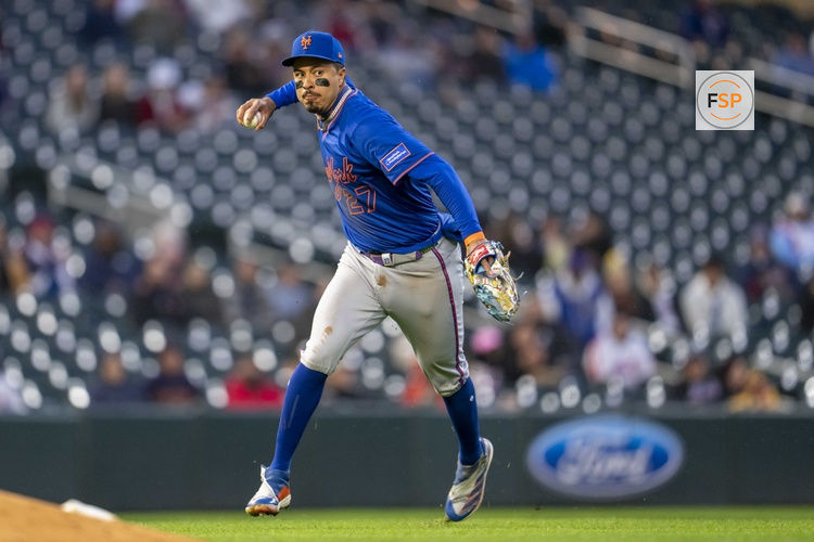 Apr 14, 2025; Minneapolis, Minnesota, USA; New York Mets third baseman Mark Vientos (27) throws to first for an out against the Minnesota Twins at Target Field. Credit: Jesse Johnson-Imagn Images