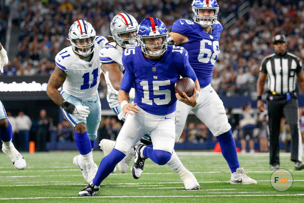 ARLINGTON, TX - NOVEMBER 12: New York Giants quarterback Tommy DeVito (15) scrambles during the game between the Dallas Cowboys and New York Giants on November 12, 2023 at AT&T Stadium in Arlington, TX. (Photo by Andrew Dieb/Icon Sportswire)