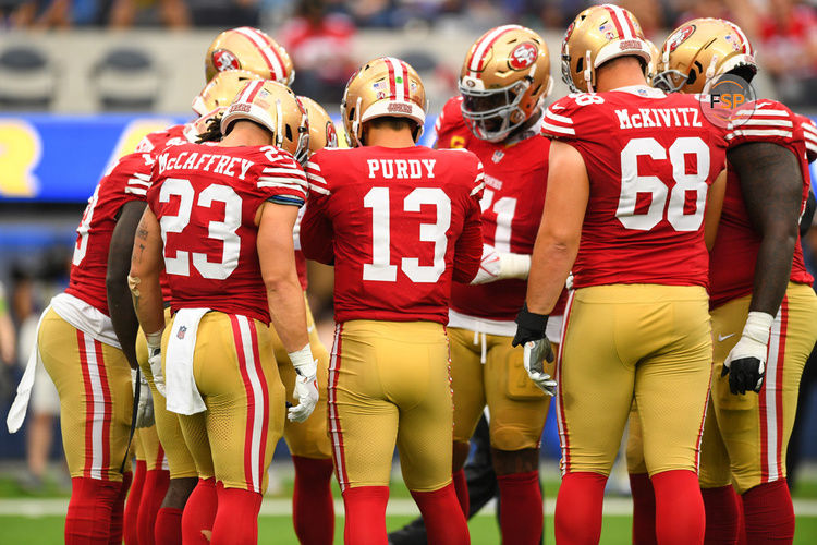 INGLEWOOD, CA - SEPTEMBER 17: San Francisco 49ers quarterback Brock Purdy (13), San Francisco 49ers running back Christian McCaffrey (23) and San Francisco 49ers offensive lineman Colton McKivitz (68) in the huddle during the NFL game between the San Francisco 49ers and the Los Angeles Rams on September 17, 2023, at SoFi Stadium in Inglewood, CA. (Photo by Brian Rothmuller/Icon Sportswire)