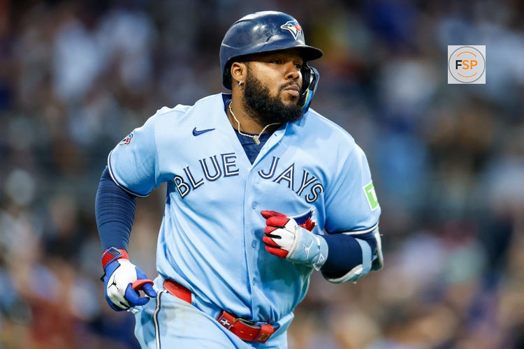 Jul 11, 2026; San Diego, California, USA; Toronto Blue Jays first basemen Vladimir Guerrero Jr. (27) hits a three-run home run during the sixth inning against the San Diego Padres at Petco Park. Credit: David Frerker-Imagn Images
