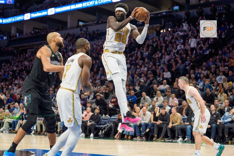 Nov 29, 2025; Minneapolis, Minnesota, USA; Boston Celtics center Neemias Queta (88) rebounds a Minnesota Timberwolves shot in the fourth quarter at Target Center. Credit: Matt Blewett-Imagn Images