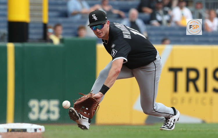 Jul 20, 2025; Pittsburgh, Pennsylvania, USA;  Chicago White Sox third baseman Colson Montgomery (12) fields a ground ball for an out against Pittsburgh Pirates third baseman Ke'Bryan Hayes (not pictured) during the fifth inning at PNC Park. Credit: Charles LeClaire-Imagn Images