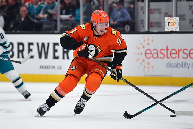 Dec 29, 2025; Anaheim, California, USA; Anaheim Ducks center Leo Carlsson (91) moves the puck against the San Jose Sharks during the second period at Honda Center. Credit: Gary A. Vasquez-Imagn Images