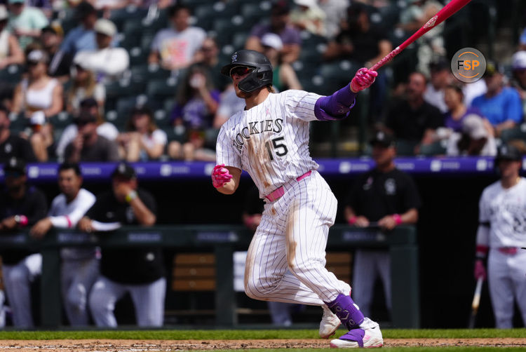 May 11, 2025; Denver, Colorado, USA; Colorado Rockies Colorado Rockies designated hitter Hunter Goodman (15) in the seventh inning against the San Diego Padres at Coors Field. Credit: Ron Chenoy-Imagn Images