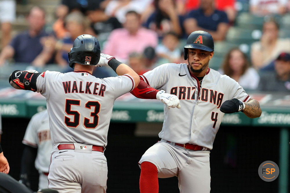 CLEVELAND, OH - AUGUST 01: Arizona Diamondbacks first baseman Christian Walker (53) and Arizona Diamondbacks second baseman Ketel Marte (4) celebrate after Walker hit a 3-run home run during the fourth inning of the Major League Baseball Interleague game between the Arizona Diamondbacks and Cleveland Guardians on August 1, 2022, at Progressive Field in Cleveland, OH. (Photo by Frank Jansky/Icon Sportswire)
