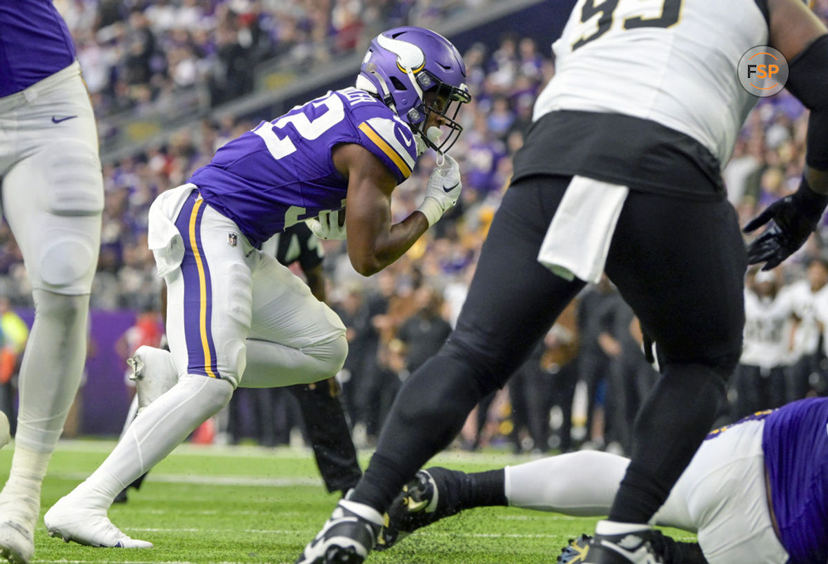 MINNEAPOLIS, MN - NOVEMBER 12: Minnesota Vikings running back Ty Chandler (32) runs in from the 2-yard line for a touchdown during the second quarter of an NFL game between the Minnesota Vikings and New Orleans Saints on November 12, 2023, at U.S. Bank Stadium in Minneapolis, MN. (Photo by Nick Wosika/Icon Sportswire)