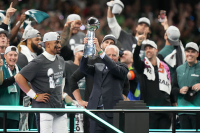 Feb 9, 2025; New Orleans, LA, USA; Philadelphia Eagles owner Jeffrey Lurie hoists the Vince Lombardi Trophy after defeating the Kansas City Chiefs in Super Bowl LIX at Ceasars Superdome. Mandatory Credit: Kirby Lee-Imagn Images