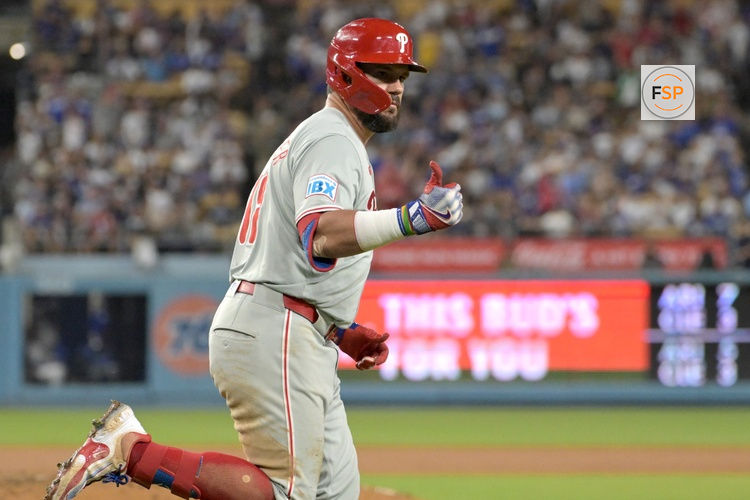 Aug 7, 2024; Los Angeles, California, USA;  Philadelphia Phillies designated hitter Kyle Schwarber (12) rounds the bases after a three-run home run in the sixth inning against the Los Angeles Dodgers at Dodger Stadium. Credit: Jayne Kamin-Oncea-USA TODAY Sports