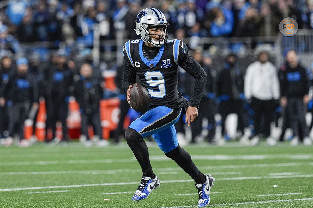 Dec 1, 2024; Charlotte, North Carolina, USA; Carolina Panthers quarterback Bryce Young (9) scrambles out of the pocket against the Tampa Bay Buccaneers during the second half at Bank of America Stadium. Credit: Jim Dedmon-Imagn Images