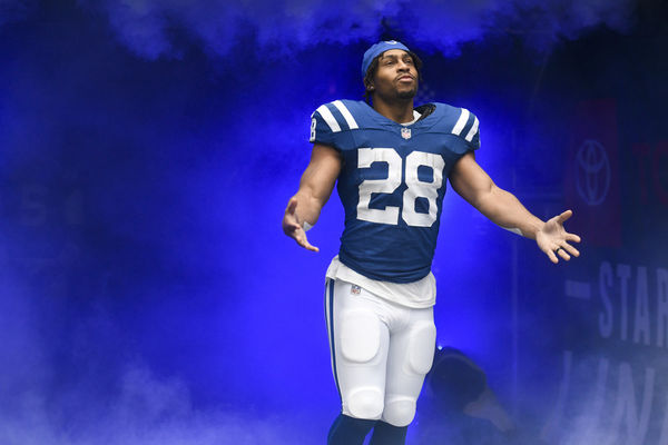 INDIANAPOLIS, IN - OCTOBER 08: Indianapolis Colts Running Back Jonathan Taylor (28) runs onto the field during player introductions before the NFL game between the Tennessee Titans and the Indianapolis Colts on October 8, 2023, at Lucas Oil Stadium in Indianapolis, Indiana. (Photo by Michael Allio/Icon Sportswire)