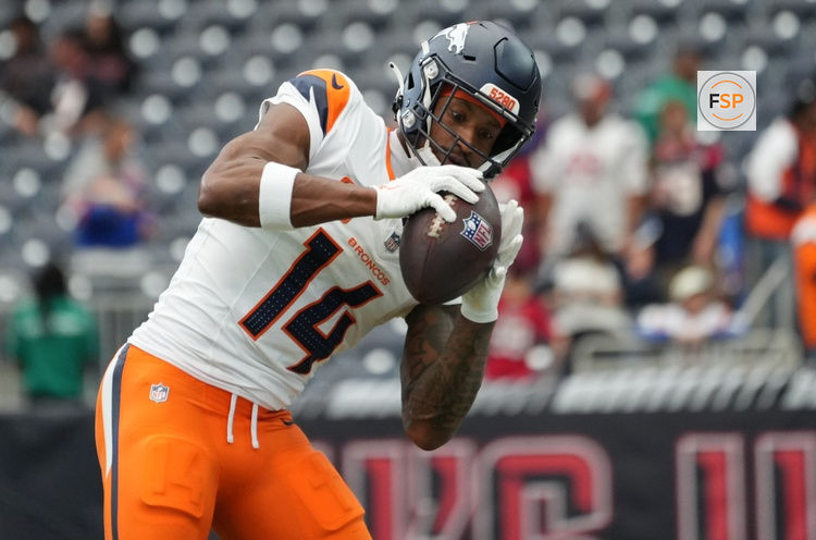 Nov 2, 2025; Houston, Texas, USA;  Denver Broncos wide receiver Courtland Sutton (14) warms up before a game against the Houston Texans at NRG Stadium. Credit: Sean Thomas-Imagn Images