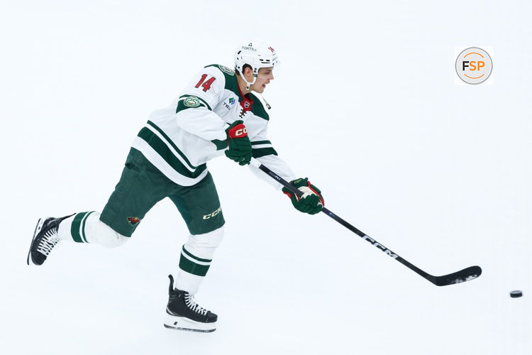 Jan 8, 2026; Seattle, Washington, USA; Minnesota Wild center Joel Eriksson Ek (14) warms up before the game against the Seattle Kraken at Climate Pledge Arena. Credit: Kevin Ng-Imagn Images