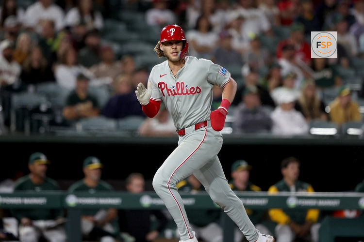 May 23, 2025; West Sacramento, California, USA; Philadelphia Phillies third baseman Alec Bohm (28) scores a run against the Athletics during the ninth inning at Sutter Health Park. Credit: Dennis Lee-Imagn Images