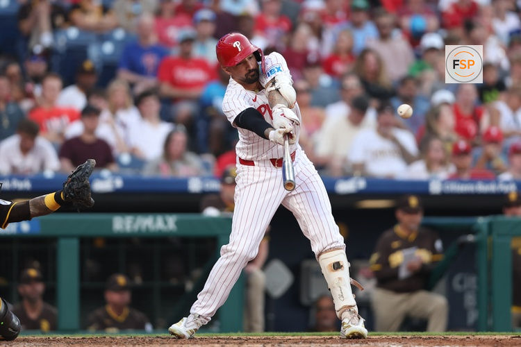 Jul 2, 2025; Philadelphia, Pennsylvania, USA; Philadelphia Phillies outfielder Nick Castellanos (8) hits an RBI single against the San Diego Padres during the fifth inning at Citizens Bank Park. Credit: Bill Streicher-Imagn Images
