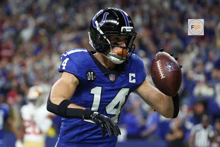 Dec 22, 2025; Indianapolis, Indiana, USA; Indianapolis Colts wide receiver Alec Pierce (14) celebrates after scoring a touchdown against the San Francisco 49ers in the second quarter of the game at Lucas Oil Stadium. Credit: Trevor Ruszkowski-Imagn Images