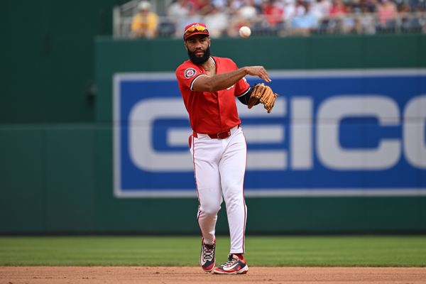 Jul 6, 2025; Washington, District of Columbia, USA; Washington Nationals third baseman Amed Rosario (13) attempts a throw to first base against the Boston Red Sox during the first inning at Nationals Park. Mandatory Credit: Rafael Suanes-Imagn Images