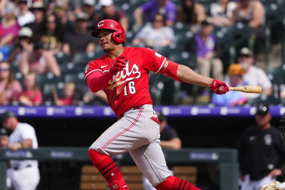 Apr 27, 2025; Denver, Colorado, USA; Cincinnati Reds third baseman Noelvi Marte (16) hits a RBI single in the ninth inning against the Colorado Rockies at Coors Field. Mandatory Credit: Ron Chenoy-Imagn Images