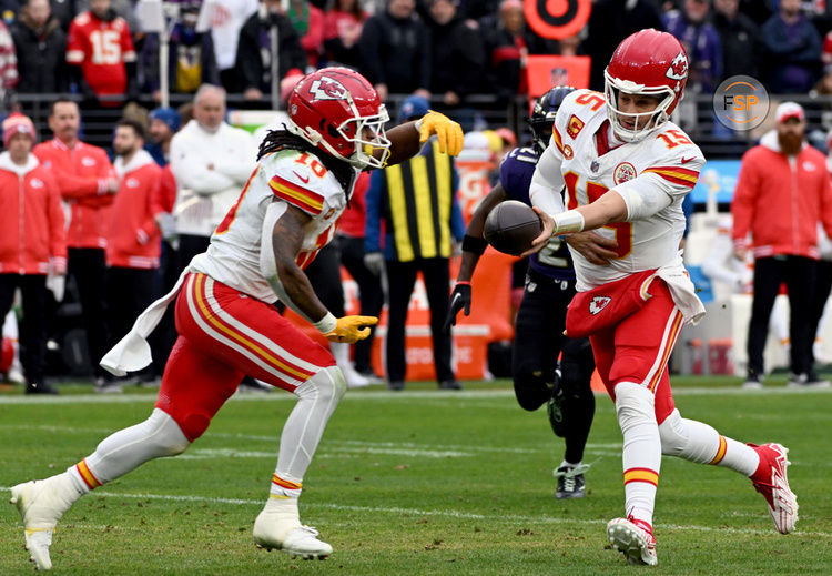 BALTIMORE, MD - JANUARY 28:  Kansas City Chiefs quarterback Patrick Mahomes (15) hands the all off to running back Isiah Pacheco (10) during the Kansas City Chiefs game versus the Baltimore Ravens in the AFC Championship Game on January 28, 2024 at M&T Bank Stadium in Baltimore, MD.  (Photo by Mark Goldman/Icon Sportswire)