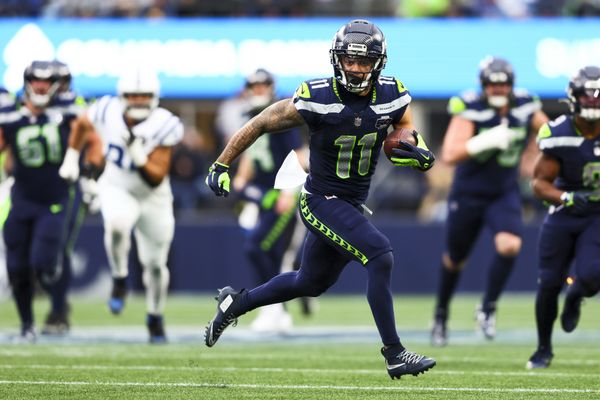 Dec 14, 2025; Seattle, Washington, USA; Seattle Seahawks wide receiver Jaxon Smith-Njigba (11) runs for yards after the catch against the Indianapolis Colts during the third quarter at Lumen Field. Mandatory Credit: Kevin Ng-Imagn Images