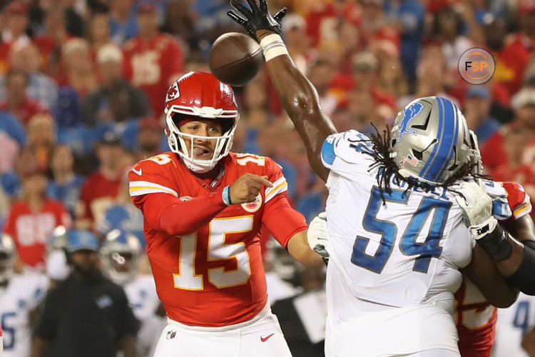 KANSAS CITY, MO - SEPTEMBER 07: Kansas City Chiefs quarterback Patrick Mahomes (15) gets a pass around Detroit Lions defensive tackle Alim McNeill (54) to tight end Blake Bell (81) for a 4-yard touchdown in the second quarter of an NFL game between the Detroit Lions and Kansas City Chiefs on Sep 7, 2023 at GEHA Field at Arrowhead Stadium in Kansas City, MO. (Photo by Scott Winters/Icon Sportswire)