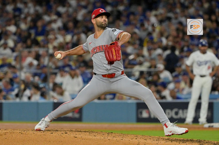 Oct 1, 2025; Los Angeles, California, USA; Cincinnati Reds pitcher Nick Martinez (28) throws a pitch against the Los Angeles Dodgers in the sixth inning during game two of the Wildcard round for the 2025 MLB playoffs at Dodger Stadium. Credit: Jayne Kamin-Oncea-Imagn Images